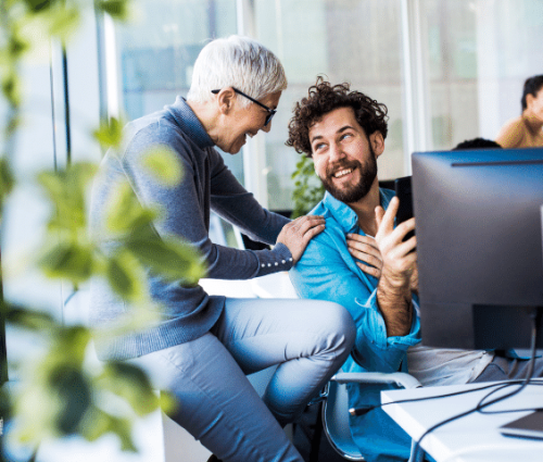 New real estate agent talking with broker and mentor