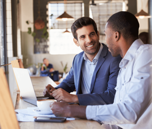 Man talking with broker about getting a real estate license