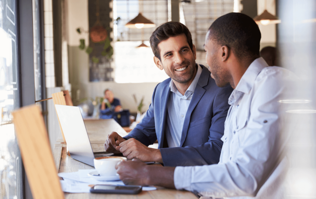 Man talking with broker about getting a real estate license